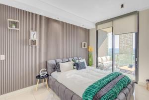 Postel nebo postele na pokoji v ubytování Aura Residence + 37 fotografií