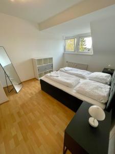 Postel nebo postele na pokoji v ubytování Apartment - Nähe CHIO Aachen