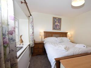 Voodi või voodid majutusasutuse 2 Bed in Holt NCC44 toas