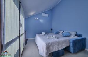 Ένα ή περισσότερα κρεβάτια σε δωμάτιο στο Cozy Apartment in Varenna Stunning View with Air Conditioning