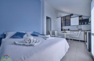 Ένα ή περισσότερα κρεβάτια σε δωμάτιο στο Cozy Apartment in Varenna Stunning View with Air Conditioning +3 φωτογραφίες