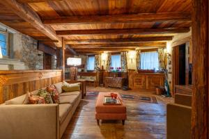 Posezení v ubytování CHALET LUMIERE - Scopri il Lusso