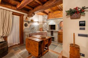 Kuchyň nebo kuchyňský kout v ubytování CHALET LUMIERE - Scopri il Lusso