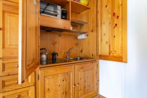 Kuchyň nebo kuchyňský kout v ubytování Hostdomus - Little Charm