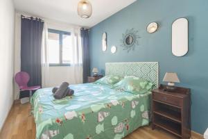 Postel nebo postele na pokoji v ubytování Nid du 5ème - Proche métro et commerce