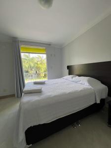 Postel nebo postele na pokoji v ubytování Hotel Absolar