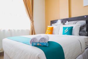 Φωτογραφία από το άλμπουμ του Sans Hotel Cemara Asri Medan σε Pulauberayan Dadap