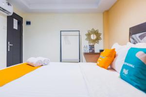 Φωτογραφία από το άλμπουμ του Sans Hotel Cemara Asri Medan σε Pulauberayan Dadap