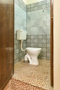 Un baño de Immanuel Homestay, Kalathipady, Kottayam, Flat D