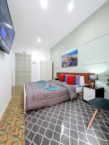 Μια τηλεόραση ή/και κέντρο ψυχαγωγίας στο Holiday Stay Studio Apartment next to Valletta