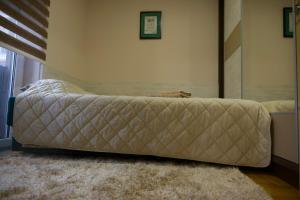 Ένα ή περισσότερα κρεβάτια σε δωμάτιο στο Apartman Stefan Vrnjacka Banja