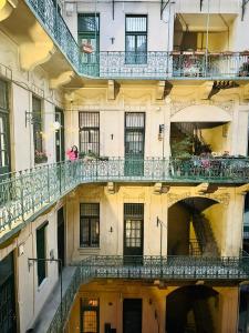 an external view of a building with a balcony at Gaia Astoria in Budapest