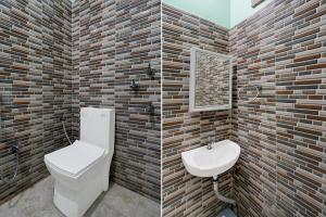 Koupelna v ubytování Super Hotel O Juran Chapra Muzaffarpur Formerly Ramco Residential + 20 fotografií