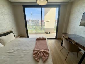 Postel nebo postele na pokoji v ubytování Lux bay + 11 fotografií