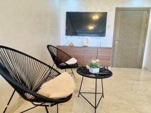 TV a/nebo společenská místnost v ubytování Lux bay