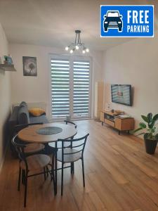 Posezení v ubytování Apartament Bazylek, miejsce parkingowe w garażu podziemnym