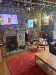 TV a/nebo společenská místnost v ubytování Pottery Flat