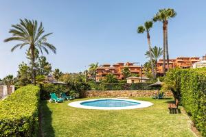 Πισίνα στο ή κοντά στο Townhouse with ocean views, BBQ, elevator, padel and pool - COSTA GALERA PARK 25