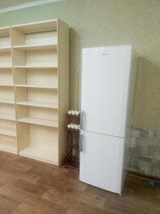 Η κουζίνα ή μικρή κουζίνα στο Отель Семейный