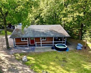 Zahrada ubytování Drentse Sleutels 6 persoons huisje met jacuzzi + 19 fotografií