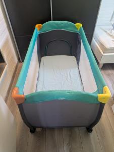 a small trampoline bed in a room at Ferienhaus LouJa in Butjadingen