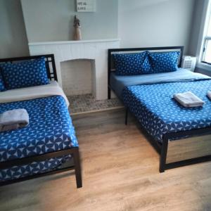 Ένα ή περισσότερα κρεβάτια σε δωμάτιο στο Full Downtown Access-Central Location-Self Checkin