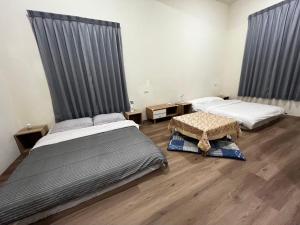 Postel nebo postele na pokoji v ubytování 哈娜家Villa + 6 fotografií