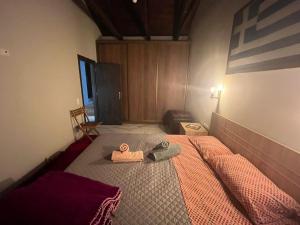 Postel nebo postele na pokoji v ubytování Despo's Guest House