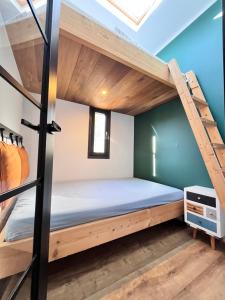 En eller flere senge i et værelse på Touareg House