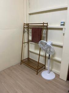 a room with a fan and a towel rack at BaanKhamSuk in Chiang Mai +46 photos
