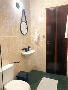 Koupelna v ubytování Pousada Pé na Areia Itanhaém