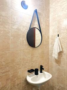 Koupelna v ubytování Pousada Pé na Areia Itanhaém