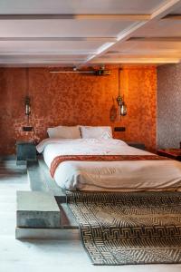 Ένα ή περισσότερα κρεβάτια σε δωμάτιο στο A Heritage Homestay-Aberfoyle Cottage