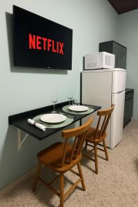 Køkken eller tekøkken på Smart Studios 102 com ar wifi e garagem prox ao Shopping + 18 billeder