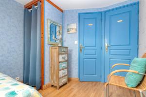 Ένα ή περισσότερα κρεβάτια σε δωμάτιο στο Le pré Nantais proche plage