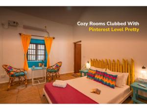 Ένα ή περισσότερα κρεβάτια σε δωμάτιο στο goSTOPS Lite Goa, Calangute