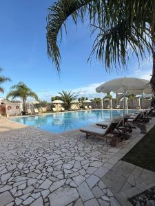 Bazén v ubytování Tenuta Masseria & Spa Chicco Rizzo nebo v jeho okolí