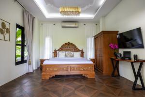 TV a/nebo společenská místnost v ubytování Dream Villa 1bd with a swimming pool