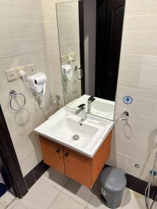 Koupelna v ubytování شقق ثري ستار للشقق الفندقية 6 + 19 fotografií