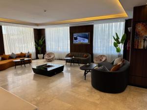 Posezení v ubytování شقق ثري ستار للشقق الفندقية 6