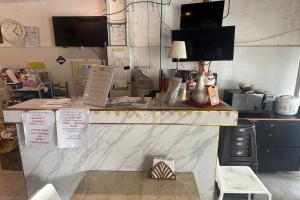 Η κουζίνα ή μικρή κουζίνα στο Sha La La Hostel