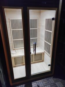 a view of a door with twowindows of a prison cell at Holiday home Vukovoj in Klenovnik