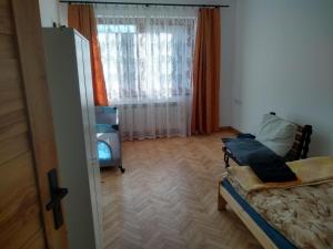 Voodi või voodid majutusasutuse Na Ogrodowej między Tatrami a Gorcami toas