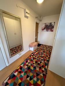 Una cama o camas en una habitación de Beautiful apartment 5 minutes from the subway 13 fotos más