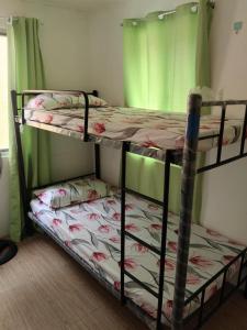 Postel nebo postele na pokoji v ubytování Affordable 2 storey transient house with free wifi in Camella Homes Koronadal