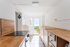 Køkken eller tekøkken på Vue Mer - Grande Terrasse - Jardin Privé & Parking