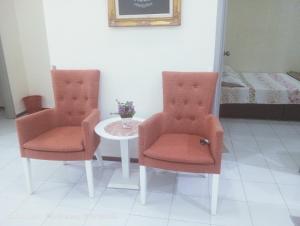 Istumisnurk majutusasutuses Homestay Bajet EM1 Pantai Remis PK +3 fotot