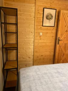 Ένα ή περισσότερα κρεβάτια σε δωμάτιο στο Dom całoroczny 6-8 osobowy