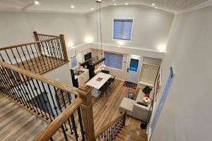 an overhead view of a living room with a staircase at Luxury Family House 3 beds, 1 bath, 5 guest in Toronto