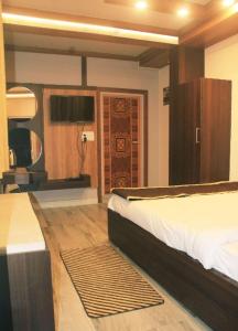 Fotografie z fotogalerie ubytování Sunny Ridge Homesty v destinaci Čérápuňdží